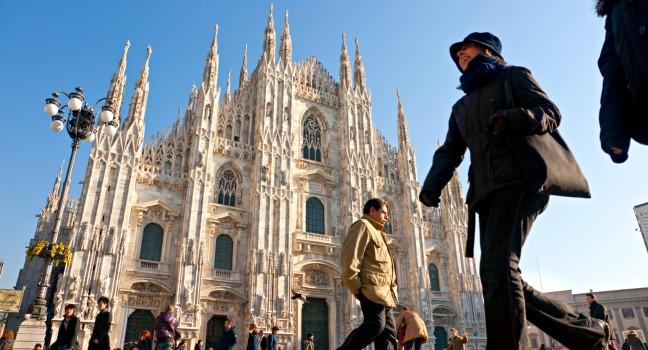 MILAN - DECEMBER 11: Tourists at Piazza Duomo on December 11, 2009 in Milan, Italy. As of 2006, Milan was the 42nd most visited city worldwide, with 1.9 million annual international visitors 