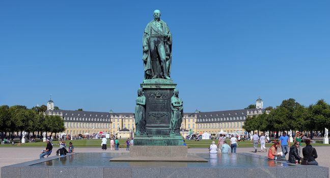 KARLSRUHE, GERMANY - SEPTEMBER 16: Monument of Karl Friedrich von Baden in front of the Karlsruhe Palace on September 16, 2012 in Karlsruhe, Germany. The monument was erected in 1840.; 