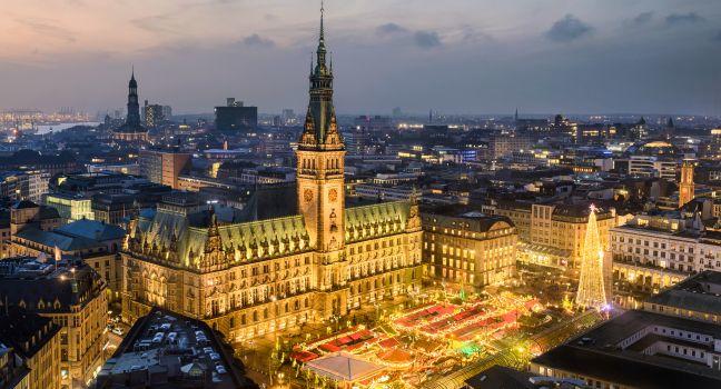 Aerial view of the City Hall with the Christmas market in Hamburg, Germany.