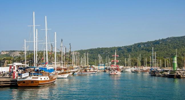 KEMER, ANTALYA - SEPTEMBER 1: Yacht and sailing vessels anchored in Kemer Marina. SEPTEMBER 1, 2014 in KEMER, ANTALYA, TURKEY.