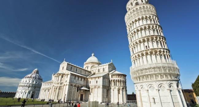 Pisa, Piazza dei miracoli, with the Basilica and the leaning tower. Shot with polarizer filter.