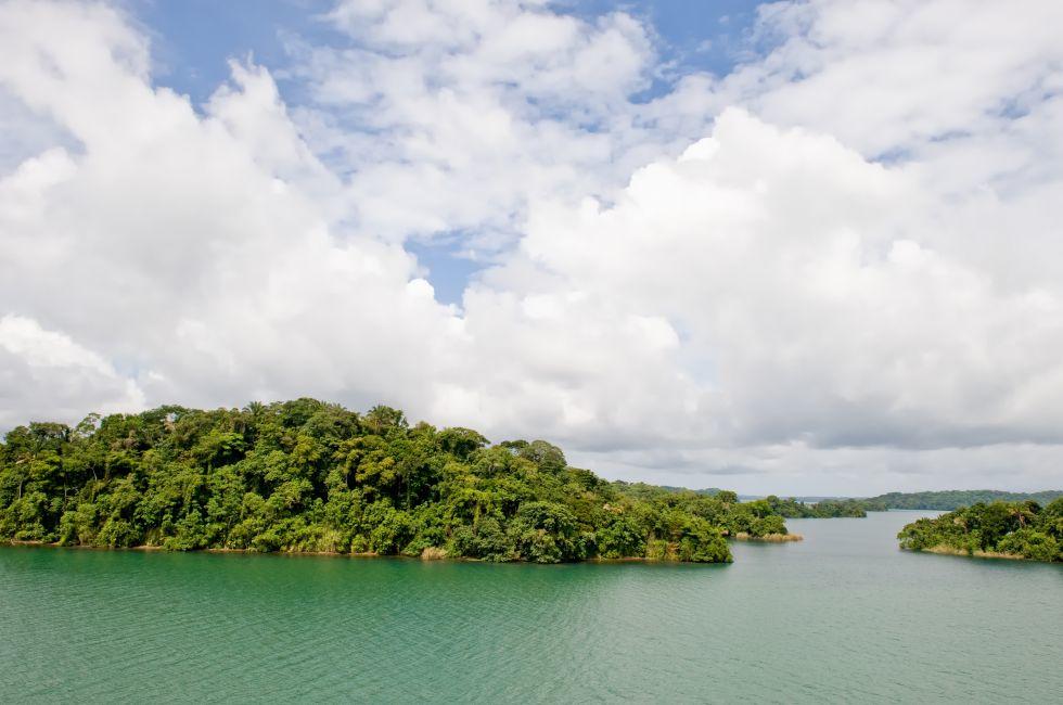 View on a Panama canal's Gatun lake, famous place for birdwatching, with beautiful cloudscape in background. .