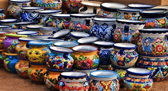 Colorful ceramic pottery with designs from Mexico and on display to be sold in a local market in the artists colony city of Tubac, Arizona, near Tucson.